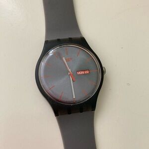 Black and Gray Swatch Wearable Watch
